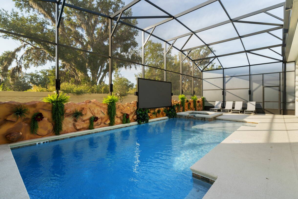 Piscina privativa climatizada com deck coberto e cascata de pedra, em mansão de temporada em Kissimmee
